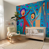 Children's room with a colorful wall mural, rocking chair, and crib.