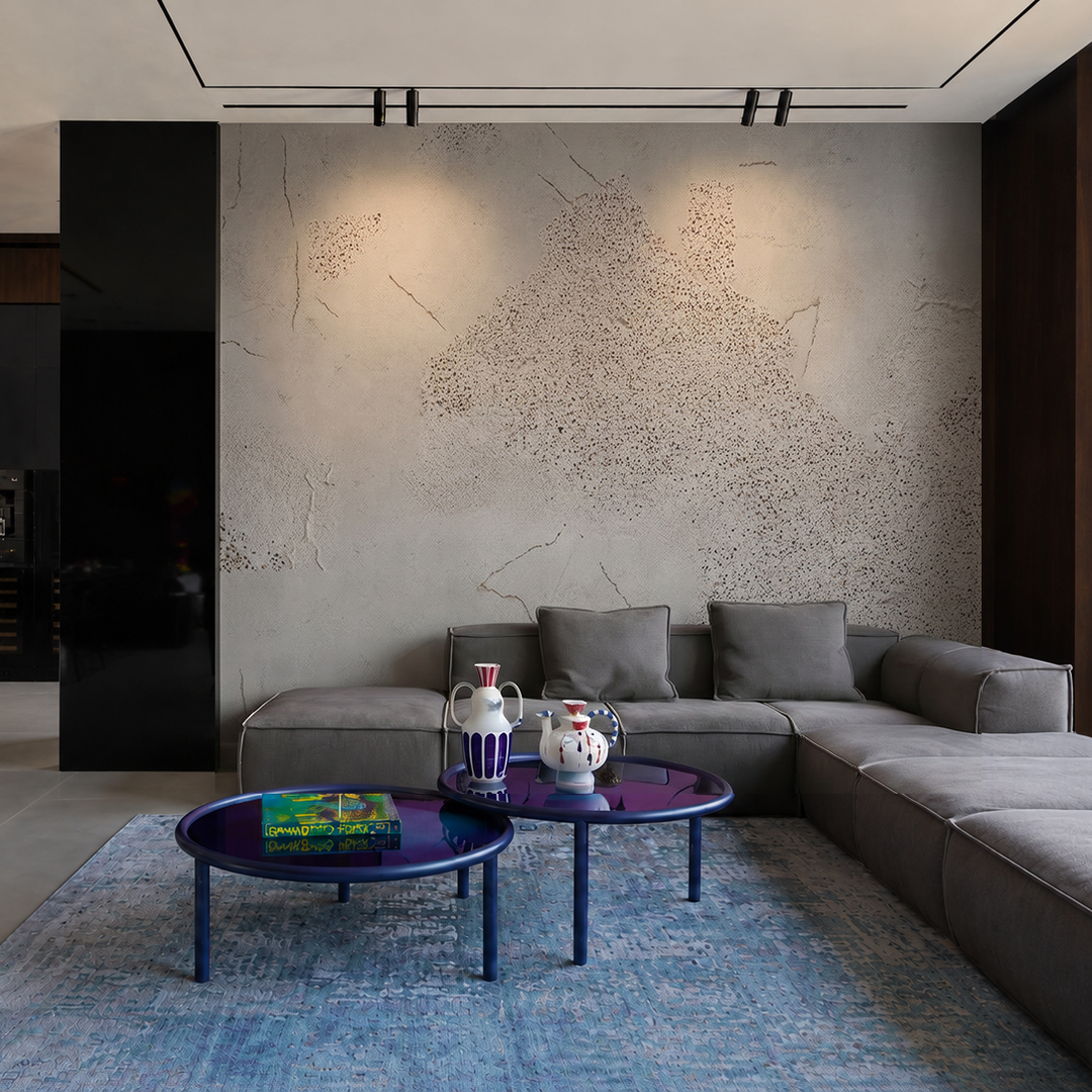 Velmora mural by Casamonte x YODEZEEN shown behind a gray sectional in a contemporary living room